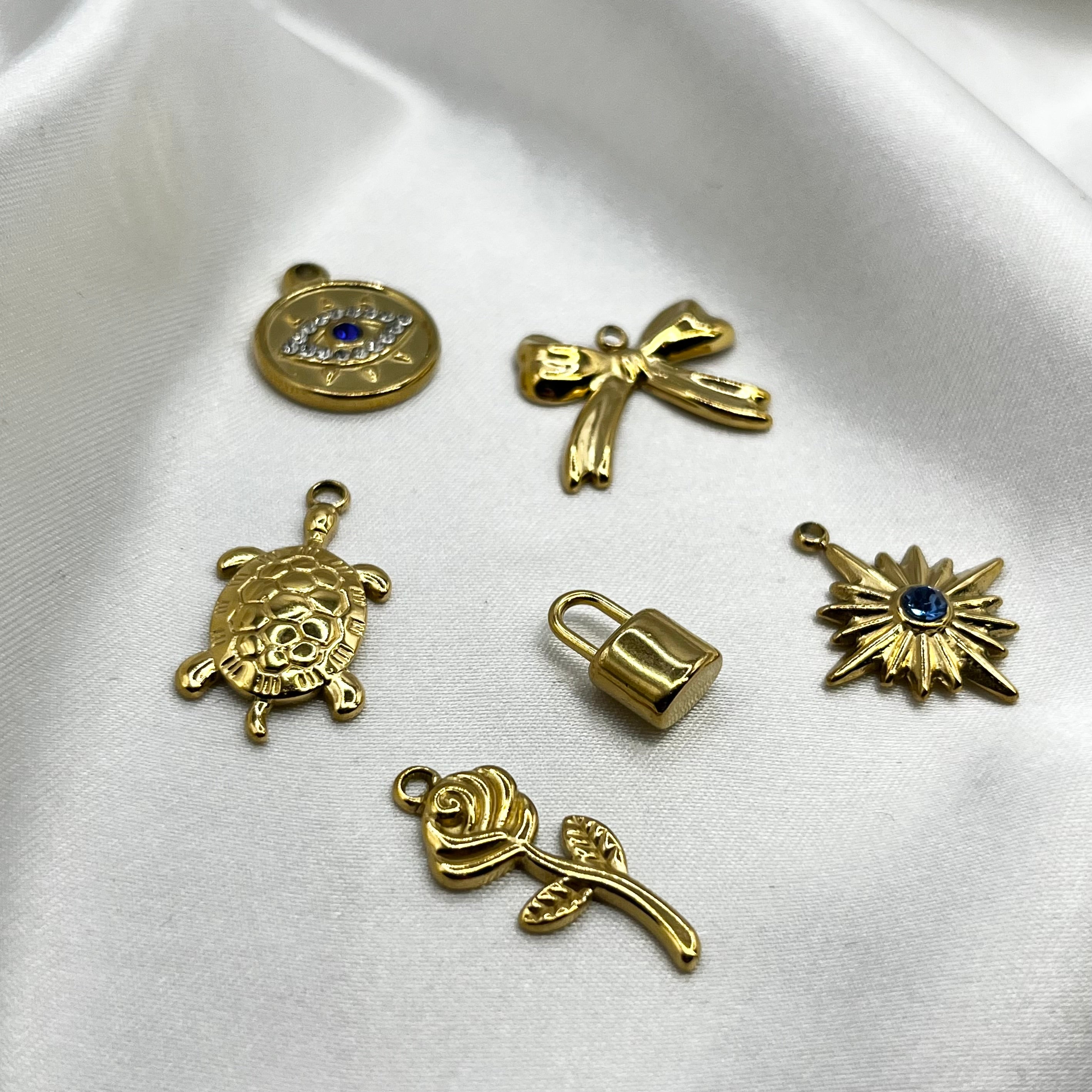 Large gold charms