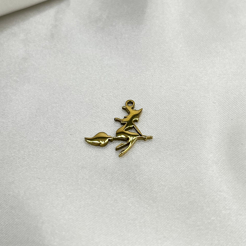 Witch on broom charm