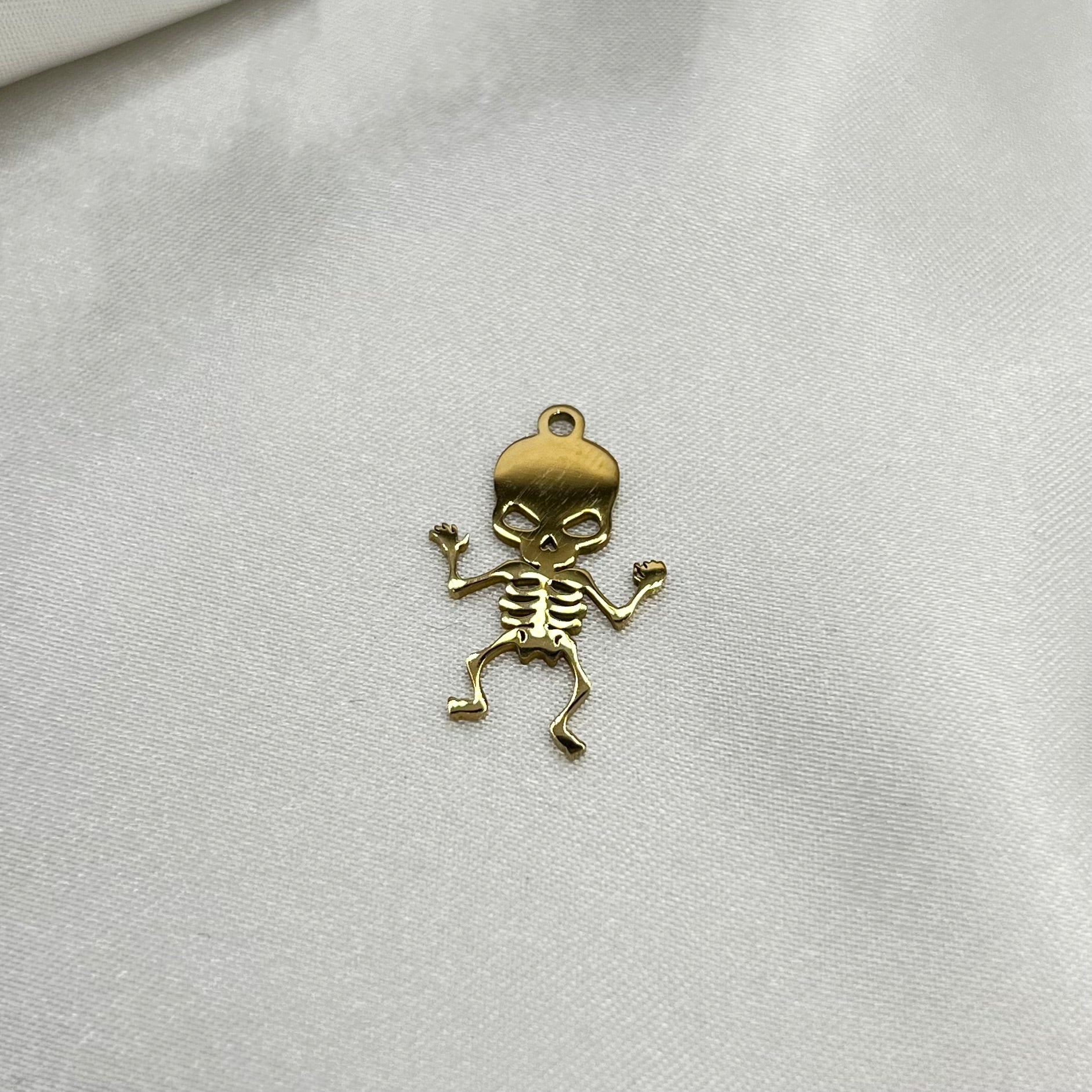 Skeleton charm