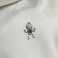 Skeleton charm